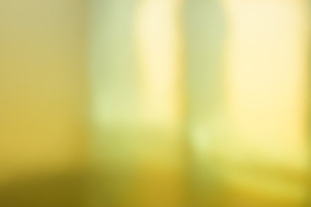 blur golden texture background with light and shadow for designの写真素材