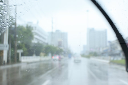traffic on highway with cars on rainy day, blur backgroundの写真素材