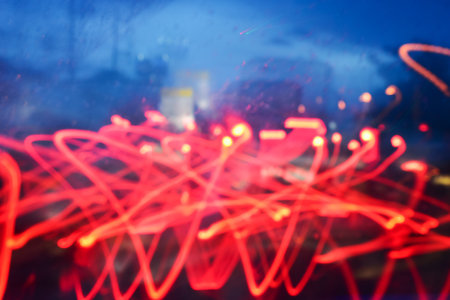 abstract light of car on road with accident in the night, blurred background