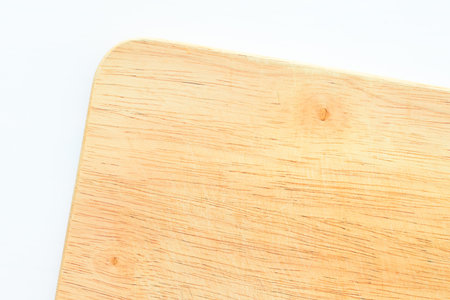 wooden cutting board isolated on white background, plank wood in the kitchenの写真素材