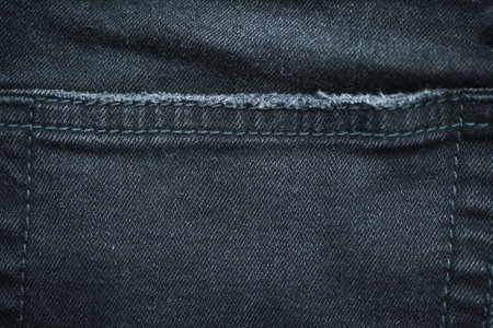 black denim clothing texture background, textile of pants fashionの写真素材