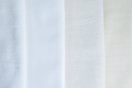 stack of white cotton clothes, textile fashion industryの写真素材
