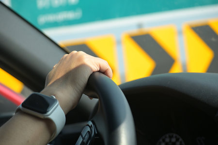 female driver hand hold steering wheel drive vehicle car rode trip travel