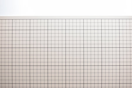 gray cutting mat board on white background with line and scale measure guide pattern for object art...