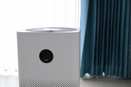 air purifier technology clean dust pm 2.5 in living room inside home for healthy care of respiratory systemの写真素材