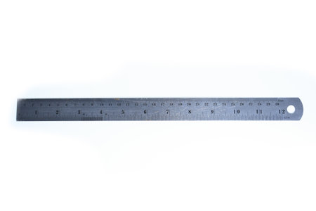 metal ruler isolated on white background, object for educationの写真素材