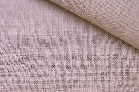 brown hemp viscose natural fabric cloth, sackcloth rough texture of textile fashion abstract backgroundの写真素材