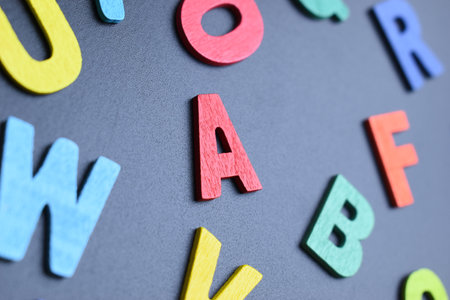 colorful letter alphabet on black background, object for education
