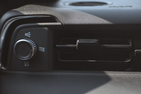 interior view of car with black leather, closeup car air conditional ventsの写真素材