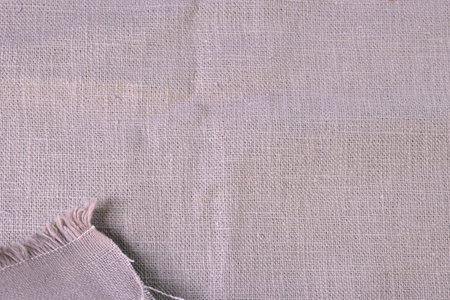 brown hemp viscose natural fabric cloth, sackcloth rough texture of textile fashion abstract backgroundの写真素材