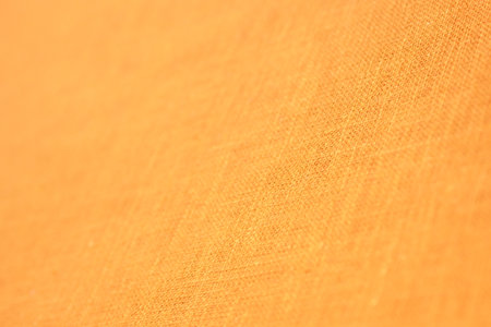 orange hemp viscose natural fabric cloth color, sackcloth rough texture of textile fashion abstract backgroundの写真素材
