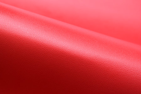 shiny red leather texture background for designの写真素材