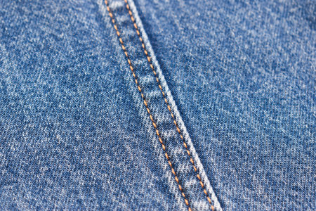 seam of blue denim texture background, jean fashion styleの写真素材