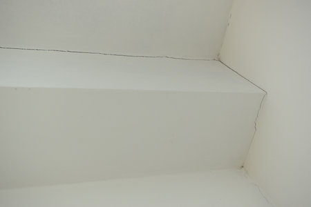 crack of white wall from earthquake, construction industryの写真素材