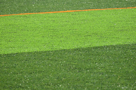 artificial green grass background for playgroundの写真素材