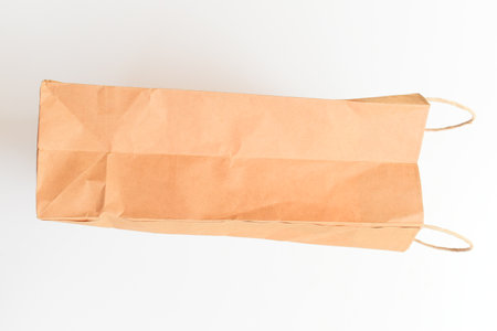 brown paper bag isolated on white background, recycle materialの写真素材