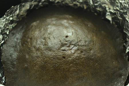 brown chocolate cake bake on aluminum foil paperの写真素材