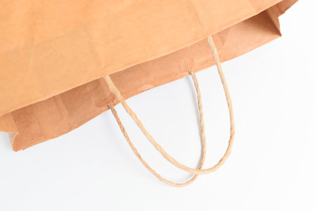 brown paper bag isolated on white background, recycle materialの写真素材