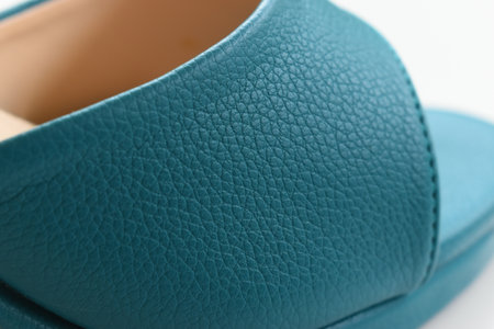 texture of green high heels shoes on white backgroundの写真素材