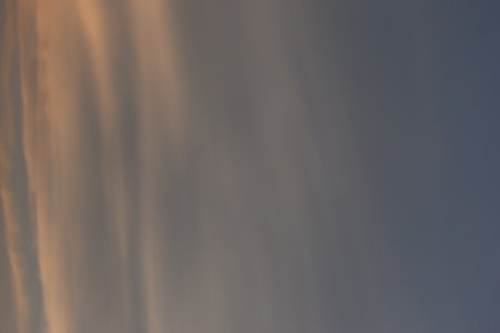 beautiful golden sky and white cloud background in springtimeの写真素材