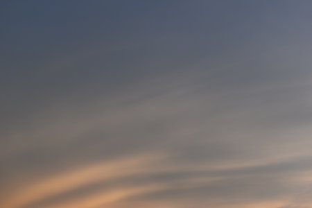 beautiful golden sky and white cloud background in springtimeの写真素材