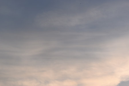 beautiful golden sky and white cloud background in springtimeの写真素材