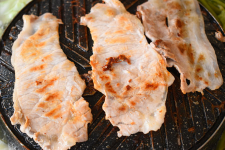 pork barbecue on frying pan, Thai style cuisineの写真素材