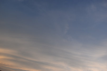 beautiful golden sky and white cloud background in springtimeの写真素材