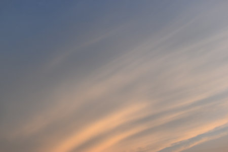 beautiful golden sky and white cloud background in springtimeの写真素材