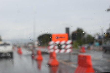 car on highway road with rainny season, blurred imageの写真素材
