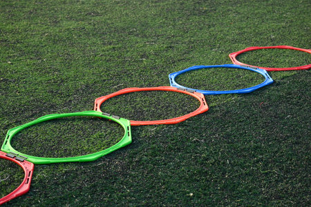 equipment of football on green grass background, object of sport