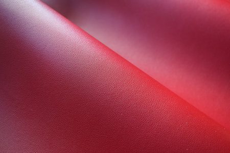 shiny red leather texture background for designの写真素材