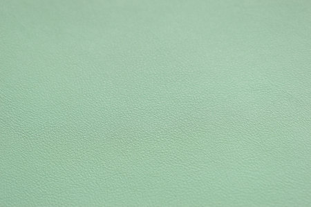 shiny light green leather texture background for design