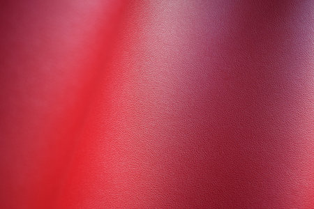 shiny red leather texture background for designの写真素材