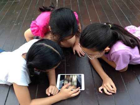 Girls browsing tablet