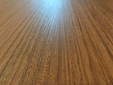 Ray of light on wooden tableの素材