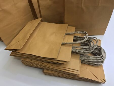 Paper shopping bags, brown paper bags with handleの写真素材