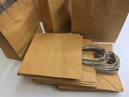 Paper shopping bags, brown paper bags with handleの写真素材