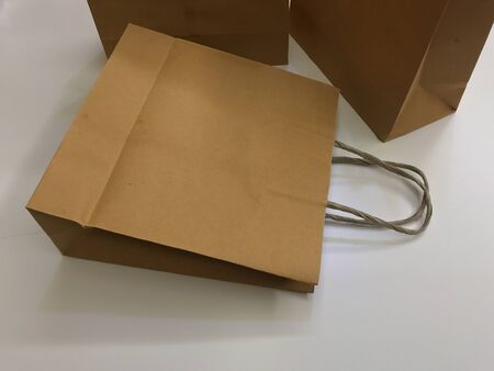 Paper shopping bags, brown paper bags with handleの写真素材