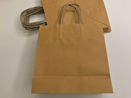 Paper shopping bags, brown paper bags with handleの写真素材