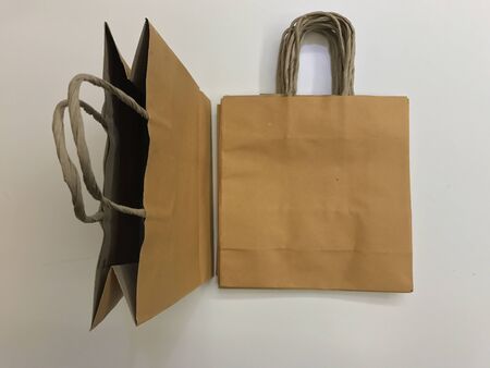 Paper shopping bags, brown paper bags with handleの写真素材