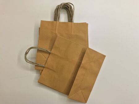 Paper shopping bags, brown paper bags with handleの写真素材
