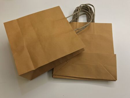 Paper shopping bags, brown paper bags with handleの写真素材