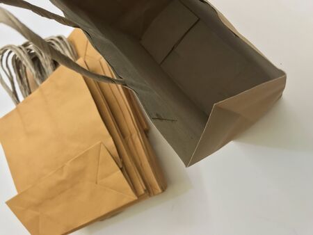 Paper shopping bags, brown paper bags with handleの写真素材