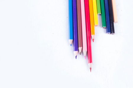 Top view, colored pencils isolated on white background. negative space. selective focusの写真素材