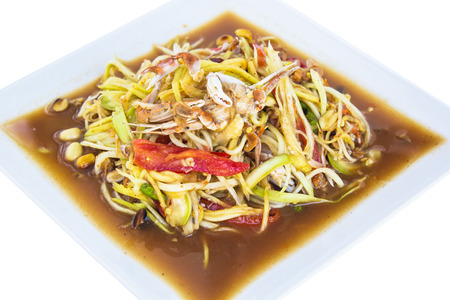 Papaya salad (Som Tam) Thai cuisine spicy delicious on whiteの写真素材