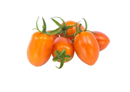 Fresh red tomato with green stem on white backgroundの写真素材