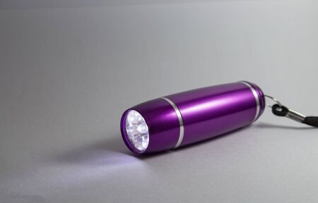flashlight led on gray backgroundの写真素材