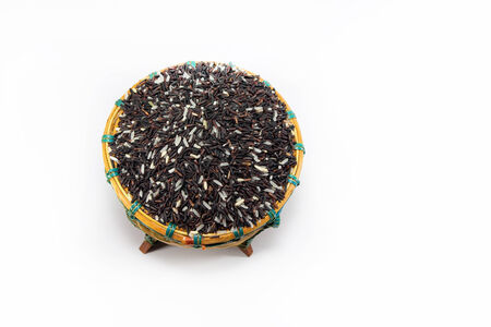 Rice berries in basketの写真素材