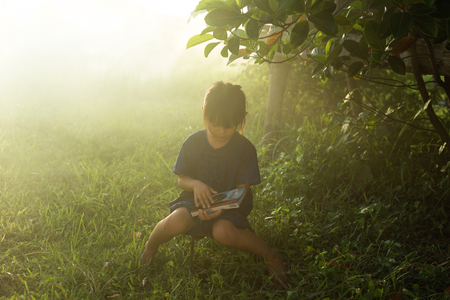 Children's reading the bookの写真素材